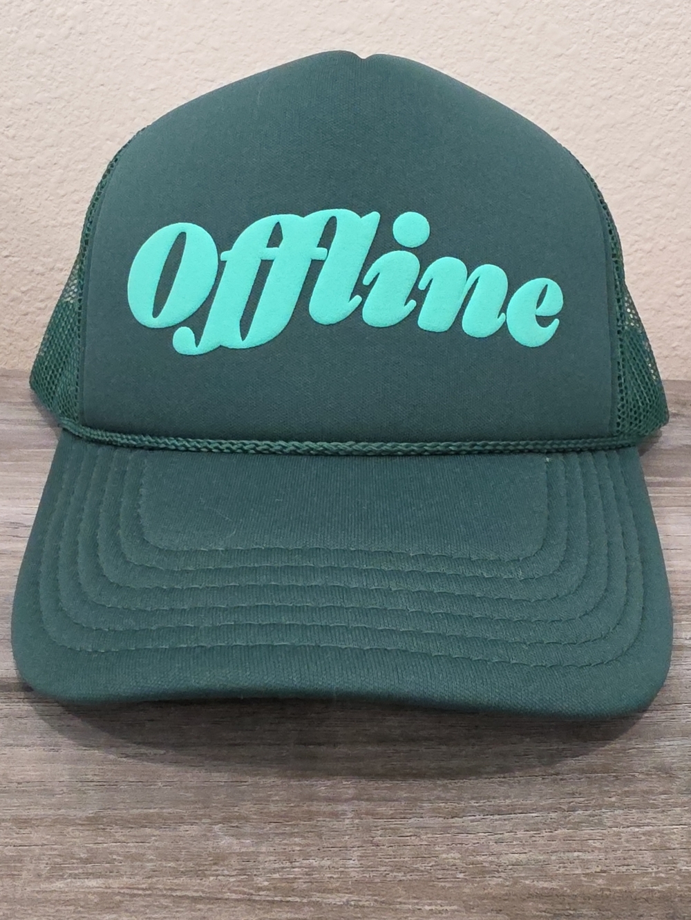 Ulta Beauty Dark Green Trucker Hat with Teal "Offline" Script